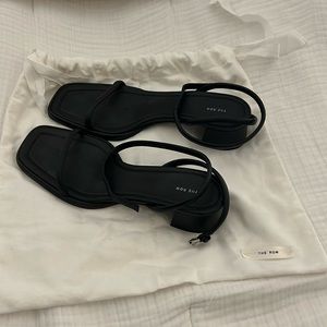 the row kate black heeled sandal